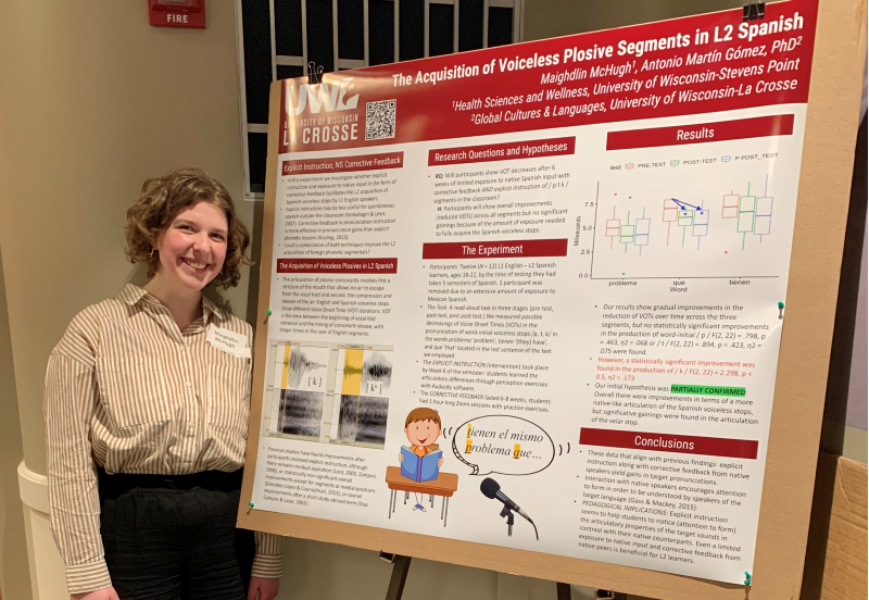 Maighdlin McHugh presents her research at the 2023 SLA Graduate Student Symposium at UMN