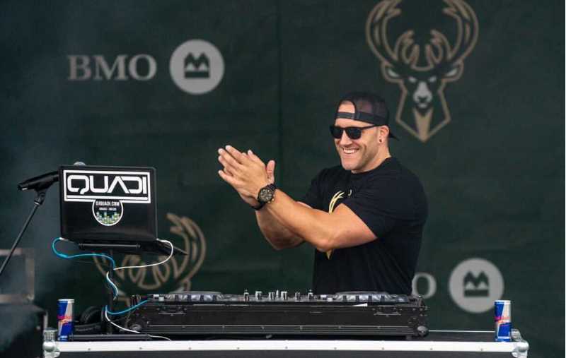 Andy Ziemann, ’07, known professionally as DJ Quadi, has carved out a career as a DJ for the Milwaukee Bucks and Green Bay Packers. During the Bucks’ title run this summer, Ziemann entertained tens of thousands of fans at the Deer District plaza outside the arena.