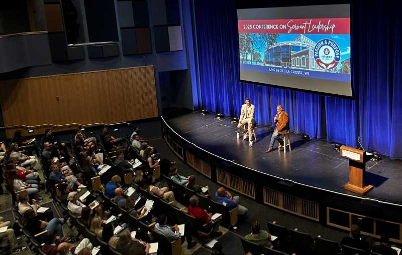 UWL Alumnus Ryan Crain, ’18, executive director of education at Ho-Chunk Nation, and Jon Greendeer, president of the Ho-Chunk Nation, speak during Viterbo University's Servant Leadership Conference.