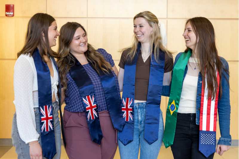 Graduating Students with International Sashes