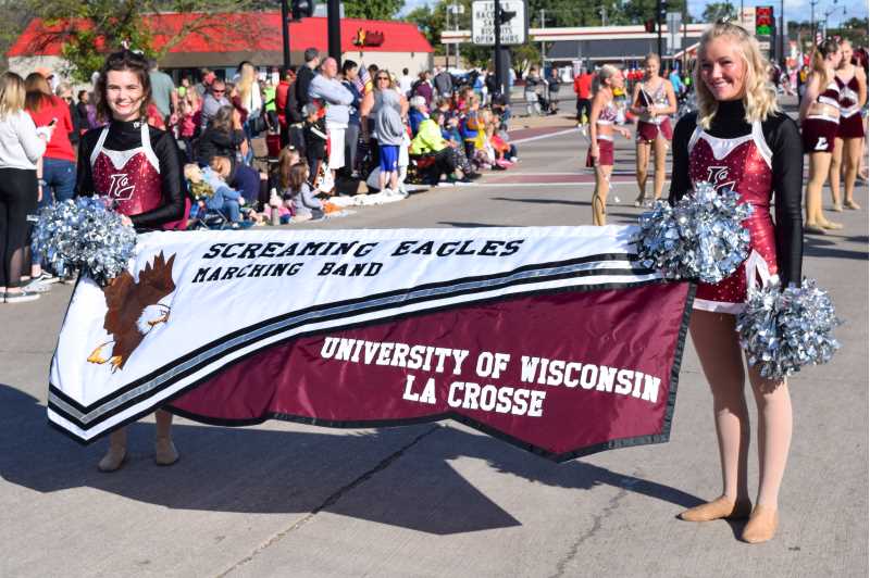 Poms carrying the SEMB banner at a parade