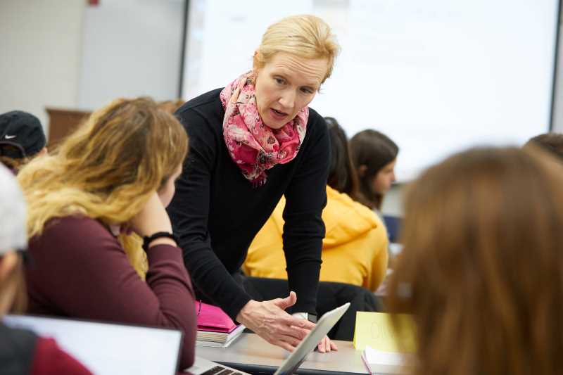 Dr. Keely Rees working with public health students. 