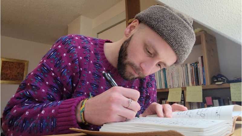 Prof. Chase Cormier in his writing workspace.