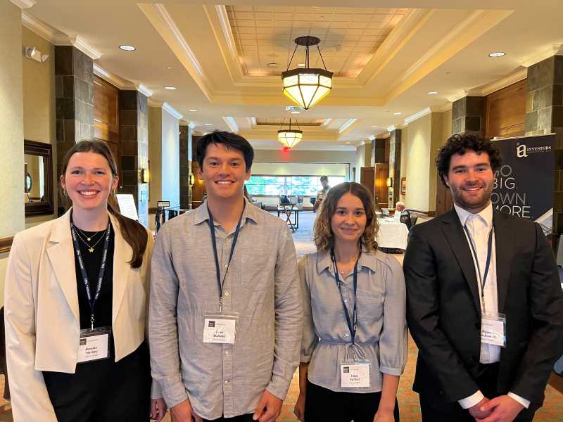 Students gather for a photo at the Symposium
