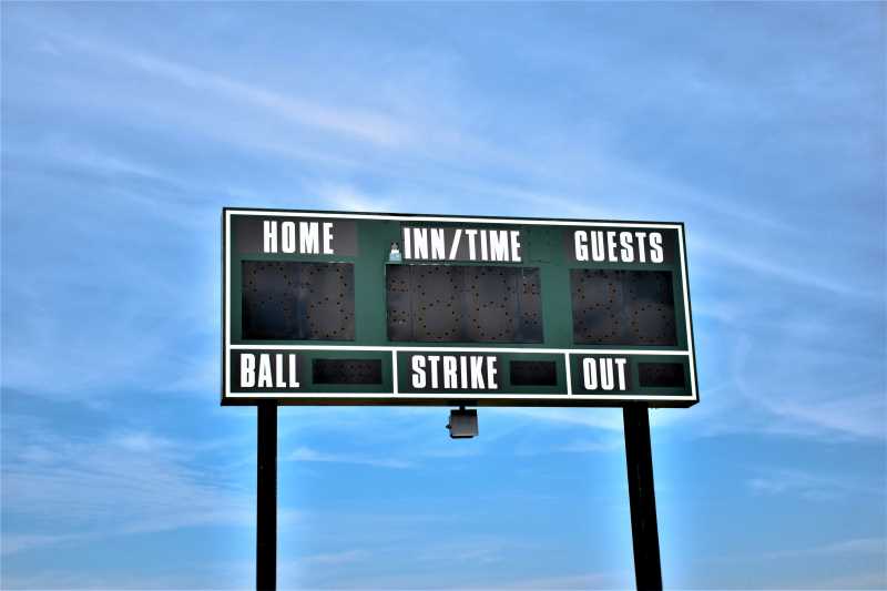 Scoreboard against a blue sky