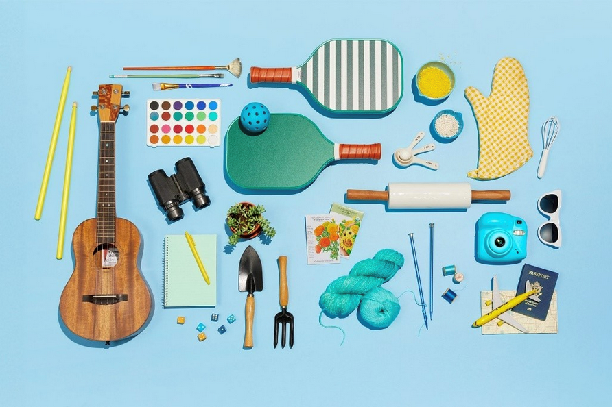 A collection of objects representing different hobbies against a blue background
