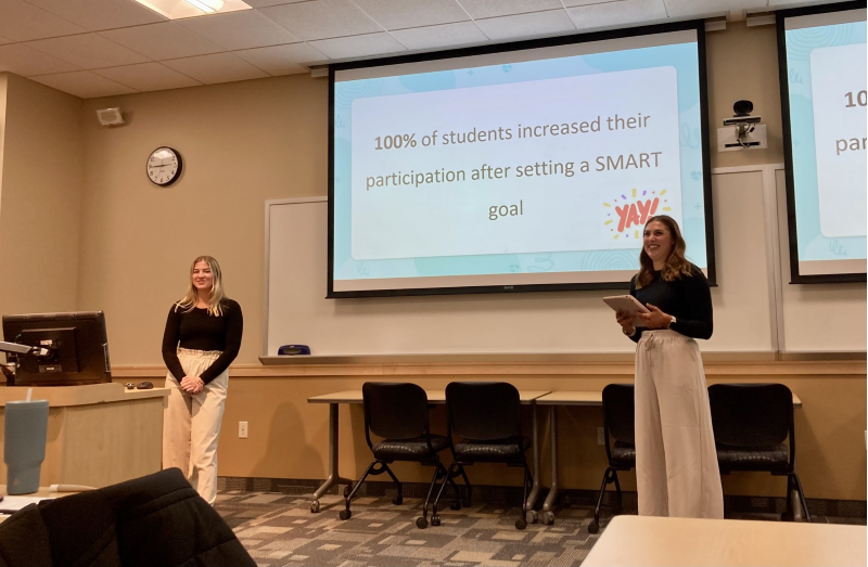 Gabby Congemi & Kelsey Miller presenting their research. 