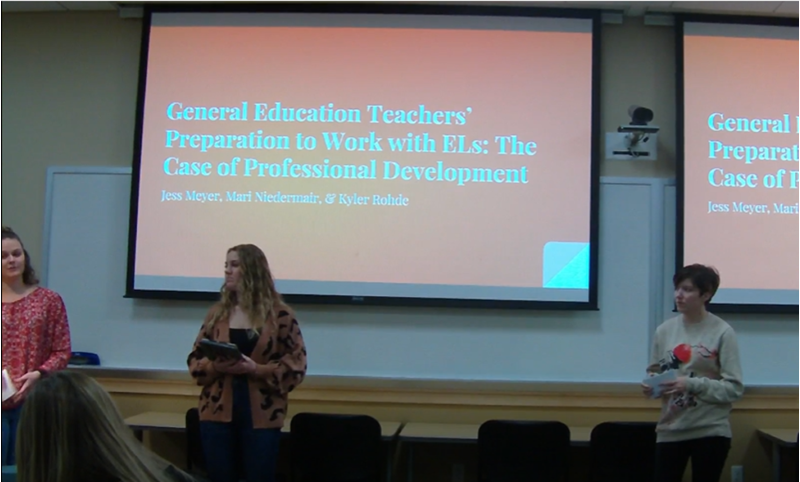 Jess Meyer, Mari Niedermair, & Kyler Rohde presenting their research. 