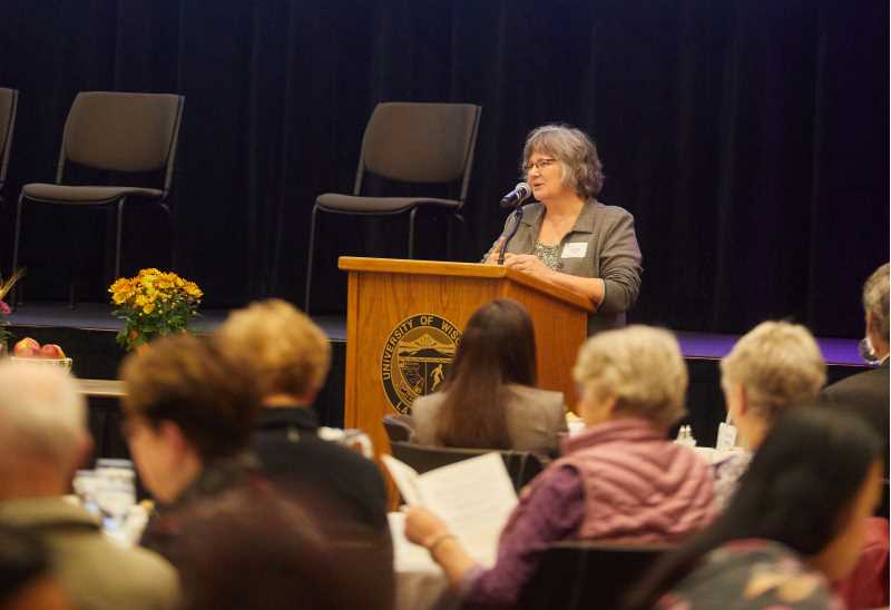 Andrea Hansen greeting guests at the SSP Locally Grown Scholarship Breakfast.