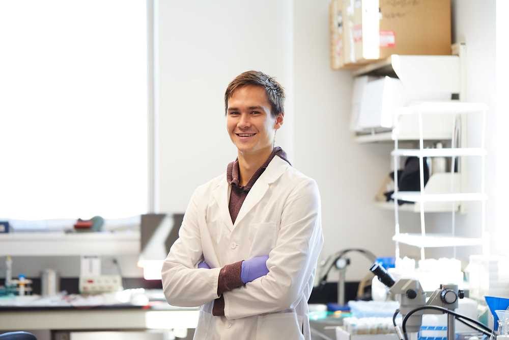 A student who researches biological clocks using fruit flies as a model system.