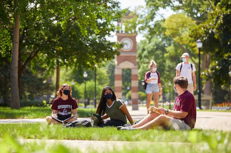 Students by the clock tower