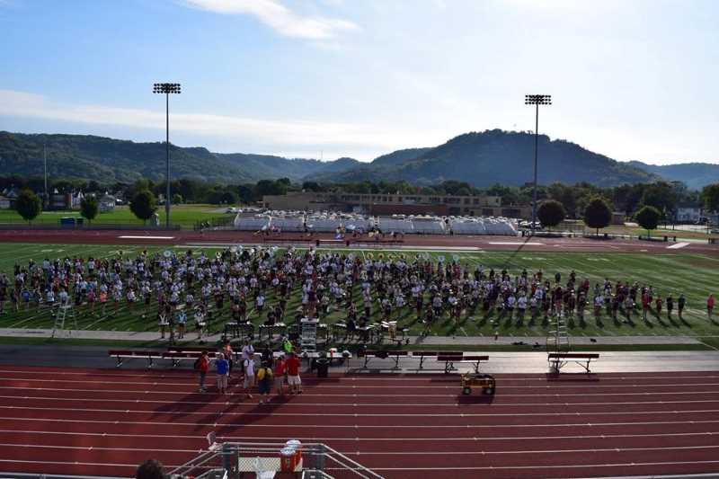 High school band joins SEMB on the field