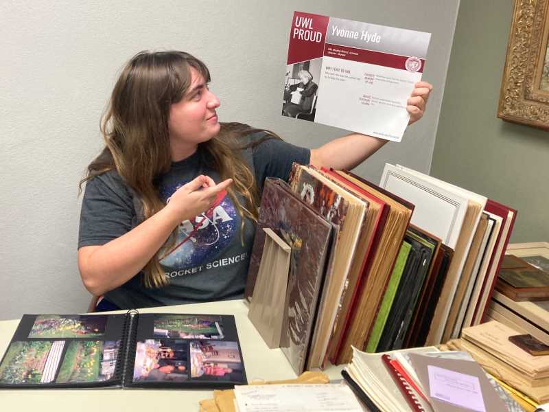Picture of Samantha working with archival resources