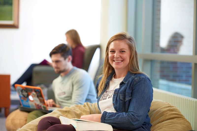 UWL students studying on the comfy bean bags in Murphy Library