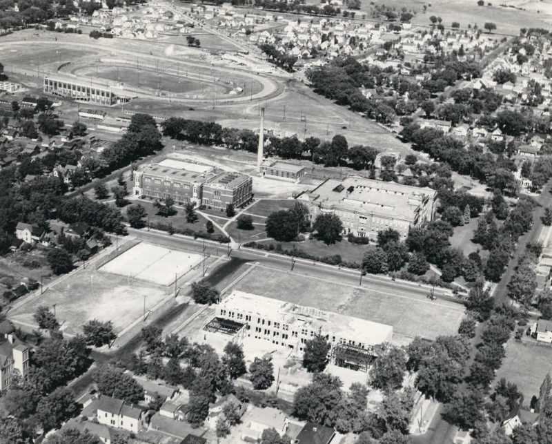 An aerial view looking east to the bluffs over the La Crosse State Teachers College with athletic field and fair grounds in the background ca. 1939. Photo courtesy UWL Murphy Library, Special Collections/ARC.