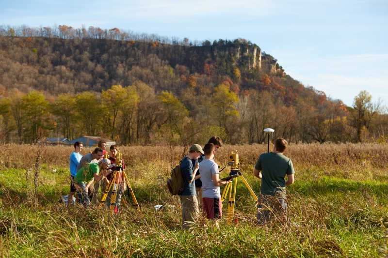 A geography class travels outdoors to learn in 2016.