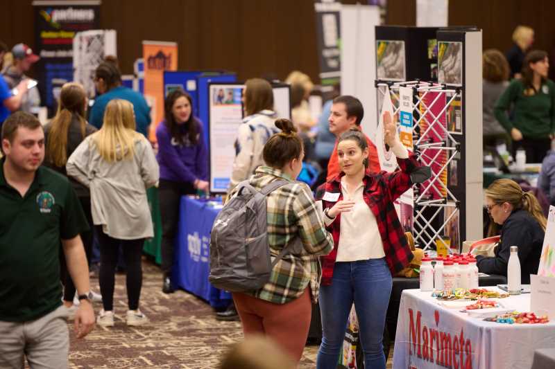 UW-La Crosse students connect with employers during a part-time job fair on campus in 2022.