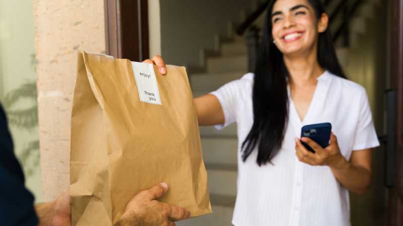 Working in food delivery is one of the most popular side hustles for college students.