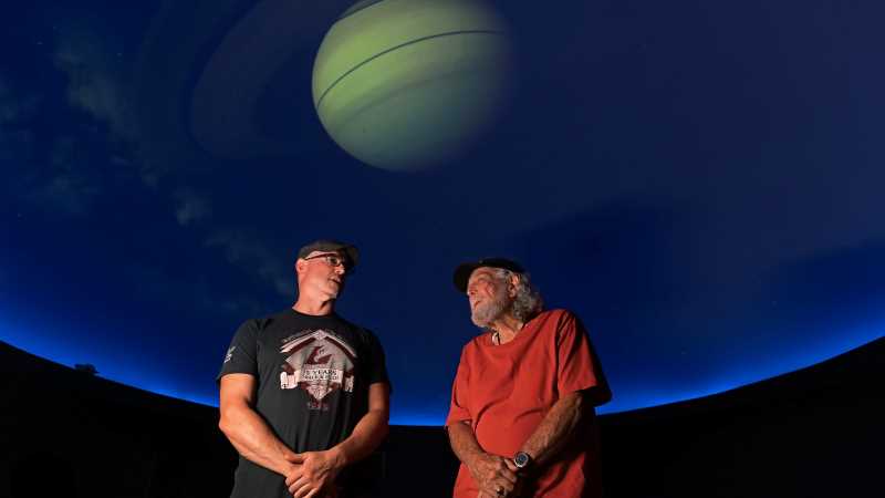 Bob Allen, UWL planetarium director (right), with former student and current Central High School Planetarium Director Chad Wilkinson. Wilkinson will carry the torch for public planetarium programming in the region.