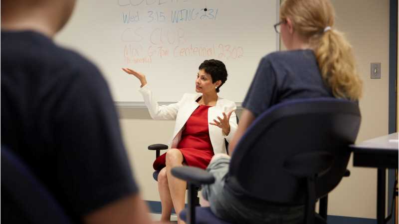 Shelmina Abji, '85, speaks with students while visiting campus to receive the Graff Distinguished Alumni Award in 2017. Abji, a former IBM executive, is the author of a new book, “Show Your Worth: 8 Intentional Strategies for Women to Emerge as Leaders at Work.” 