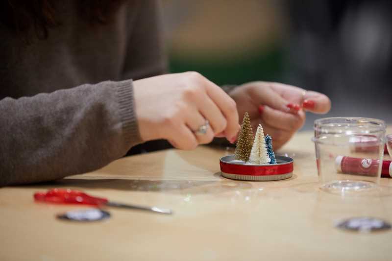 Students in the UWL It Make$ Cents programs made holiday gifts by reusing glass jars.