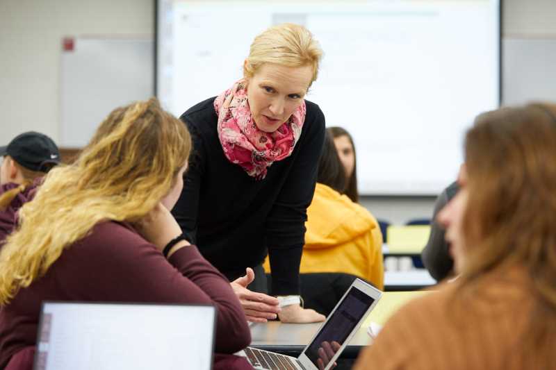 Dr. Keely Rees working with public health students.