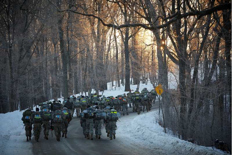 Cadets run down Grandad Bluff Road, the start of the Northern Warfare Challenge.