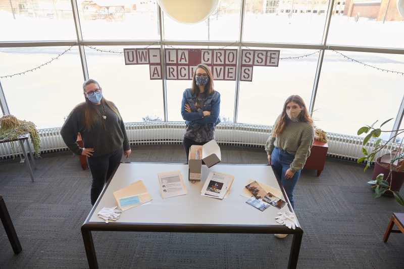 Three students working on the COVID-19 archive project at the Murphy Library Special Collections Area Research Center include, from left, Amber Boesel, Psychology and Art; Erin Spierings, Archaeology; Brittney DeChambeau, History Education. They are documenting what UWL alumni, students, faculty and staff have been experiencing during the pandemic.