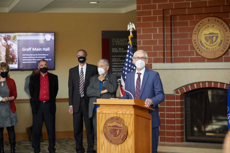 Gov. Tony Evers speaks at the opening of La Crosse County's COVID-19 vaccination clinic at UW-La Crosse on Tuesday. Initially, the clinic will administer 200 doses per day, although it expects to ramp up to 1,000 per day in the future.