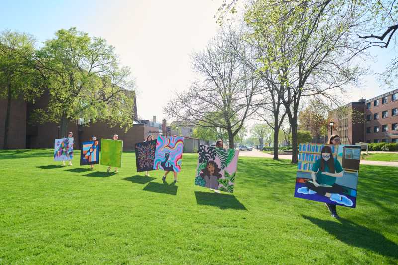 UWL art students parade their work across campus from the Center for the Arts to Murphy Library. The students participated in an initiative of Murphy Library staff Amber Leibundgut-Peterson and Marc Manke, both eager to promote the work of student artists and create a more vibrant, creative learning environment in the library.  