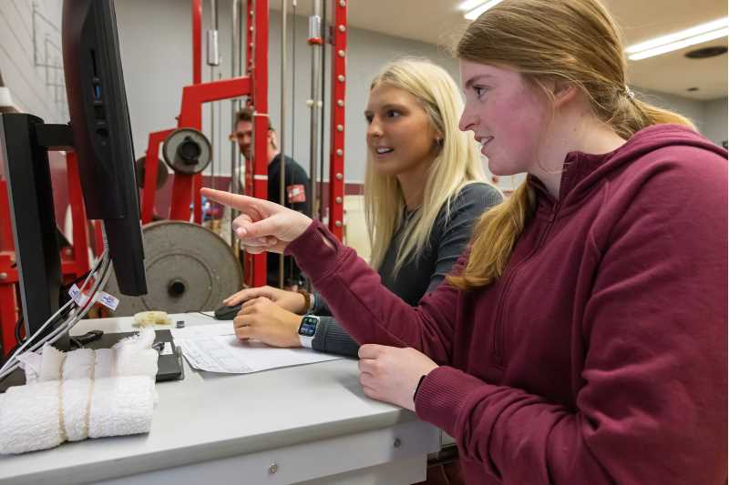 UW-La Crosse Exercise and Sport Science Department students Anna Jacobson, left, and Makenna Carpenter are two of the students who have participated in the Seed Grant Program in cooperation with Mayo Clinic Health System. Led by teams of physicians and scientists from both institutions, seed grants often launch promising new research projects and provide valuable preliminary data to attract more substantial funding from external sources. (UWL photo)
