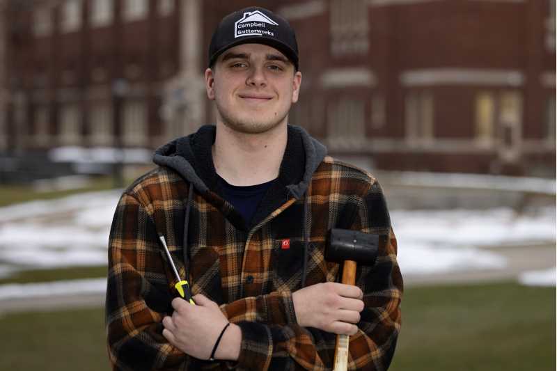 UWL student Ethan Campbell has generated a steady income by cleaning gutters and performing other odd jobs for homeowners around La Crosse and his native River Falls.