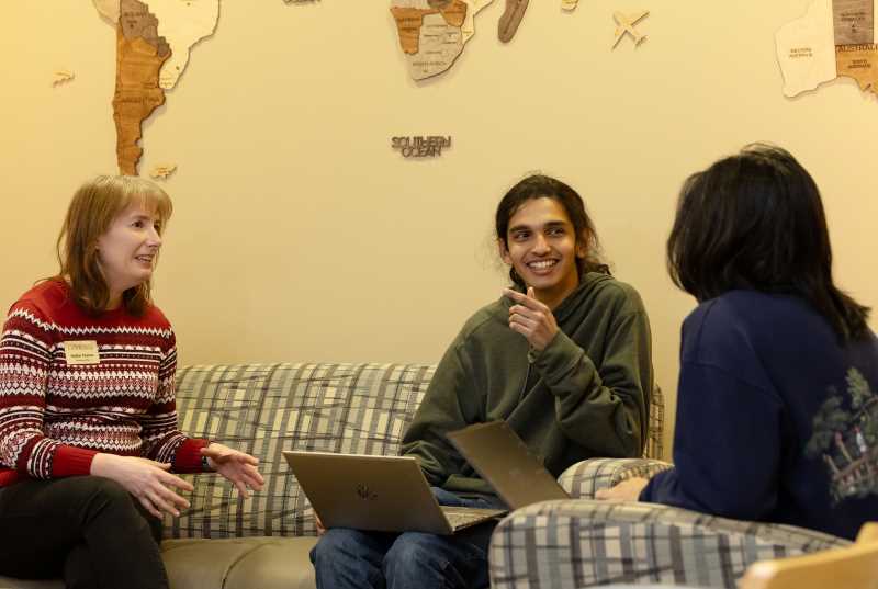 International Admissions Counselor Heather Pearson, left, meets with international students from Malaysia, Aditya Anil, center, and Aaron Jeyaraj. Both students are from Methodist College Kuala Lumpur (MCKL).