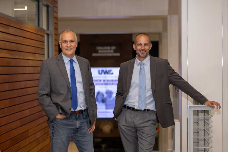 UWL College of Business Administration faculty and Mayo Clinic Health System leaders merged academic insight with industry expertise to help shape a better healthcare experience for all. [Pictured left to right: Uzay Damali and Tanner Holst]