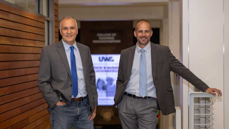 UWL College of Business Administration faculty and Mayo Clinic Health System leaders merged academic insight with industry expertise to help shape a better healthcare experience for all. [Pictured left to right: Uzay Damali and Tanner Holst, '01]