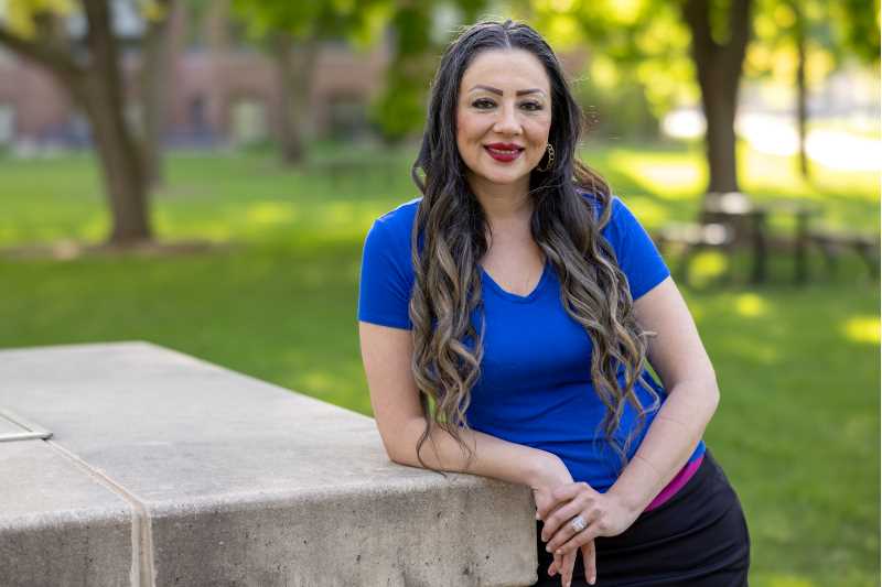 Sona Kazemi, assistant professor of race, gender and sexuality studies, is one of six faculty to receive a 2025 Eagle Teaching Excellence Award.