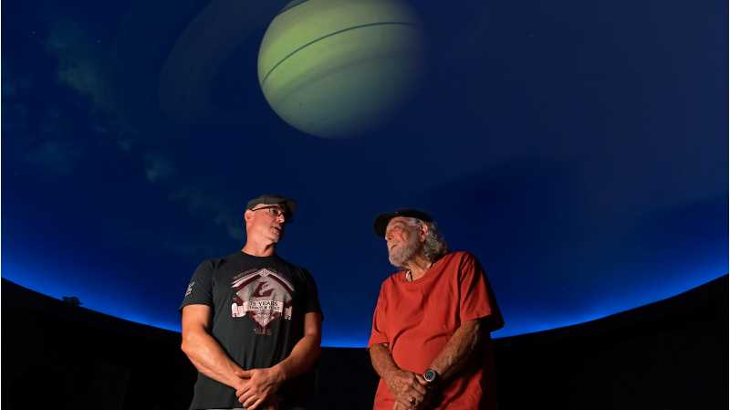 Bob Allen, UWL planetarium director (right), with former student and current Central High School Planetarium Director Chad Wilkinson. Wilkinson will carry the torch for public planetarium programming in the region.