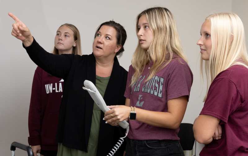One of the fastest growing areas in Health Professions is Radiologic Sciences. From left, UWL student Ally Richarson, Director of Radiologic Sciences Melissa Weege, and UWL students  Maddy Benson and Emma Strassburg are using VERT- radiation therapy virtual reality software.