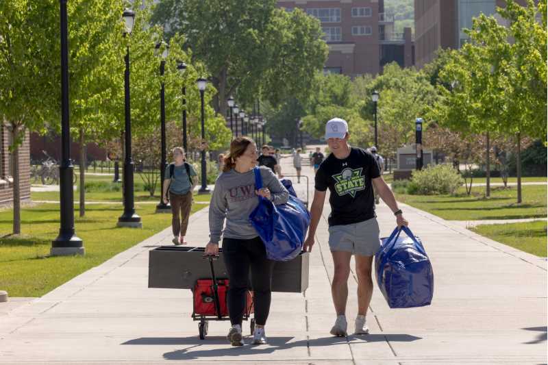 UWL students carry items to their residence halls during move in days in fall 2025.