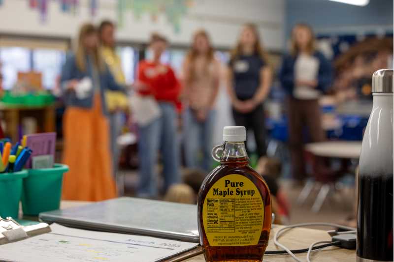 UWL Early Childhood and Elementary Middle Education preservice teachers partnered with Summit Elementary to teach hands-on lessons on Wisconsin maple syrup production.