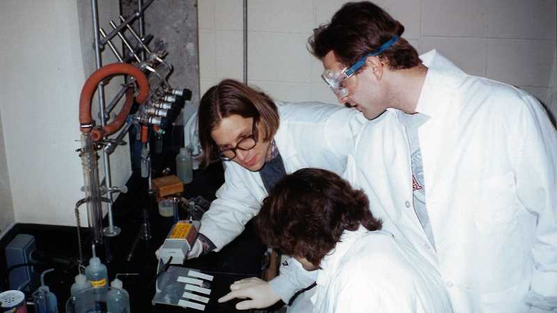 Chemistry Professor Aaron Monte with students in the research lab in the late 1990s. Monte was part of the wave of new faculty on campus in the 1990s that believed in the value of undergraduate research.