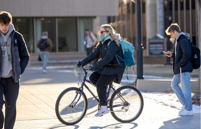Campus community members get to class by bike and walking during the first day of classes this fall.