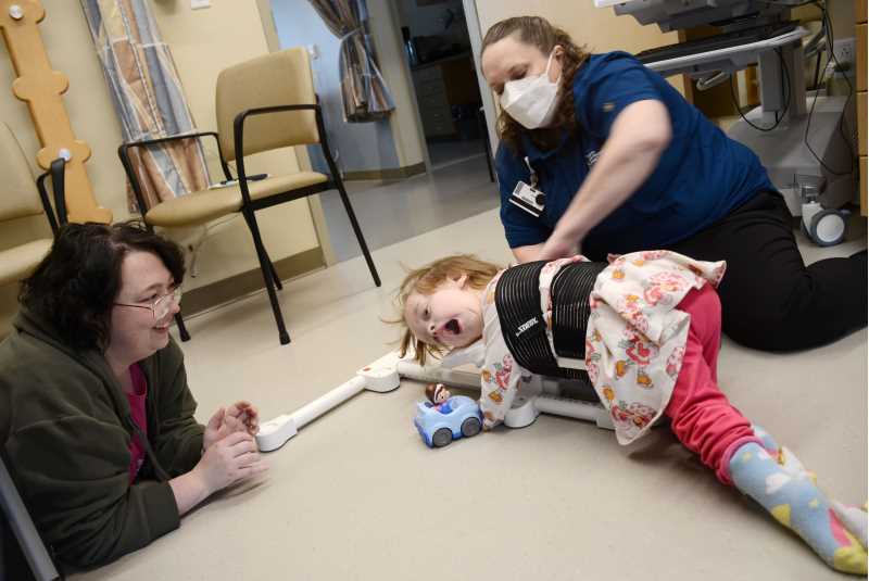  Cassidy (Coggon) Sanchez, ’00, helped to invent an adaptive mobility device for her young patients after observing an unmet need.