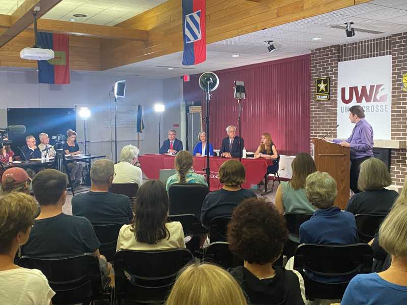 The four Democratic candidates took part in a debate on campus July 20. Pictured, from right, Assistant Professor Anthony Chergosky, Rebecca Cooke, Mark Neuman, Deb Baldus McGrath, Brad Pfaff and the area reporters asking the questions. 