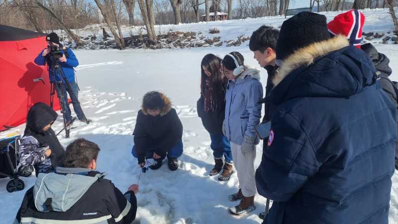 UW-La Crosse international students joined campus police and others for a day of ice fishing at Pettibone Park. The second-annual event was started as a way to build mutual trust and understanding, and to introduce international students to the Wisconsin wintertime tradition.