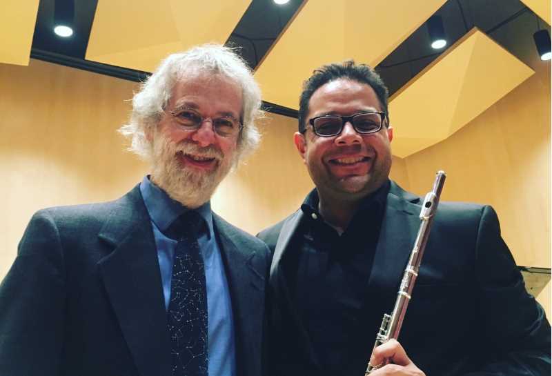 UWL associate professor of music, Jonathan Borja (right), and celebrated Mexican composer Samuel Zyman have become friends after meeting at a music convention several years ago. The two have much in common, including their hometown and passion for flute music.