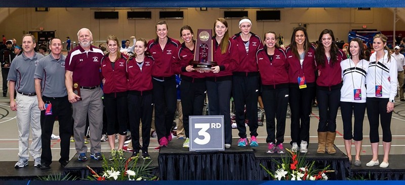 Group shot of team with trophy.