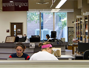 20120604_Students__Library_0001we Students in reference area in library.