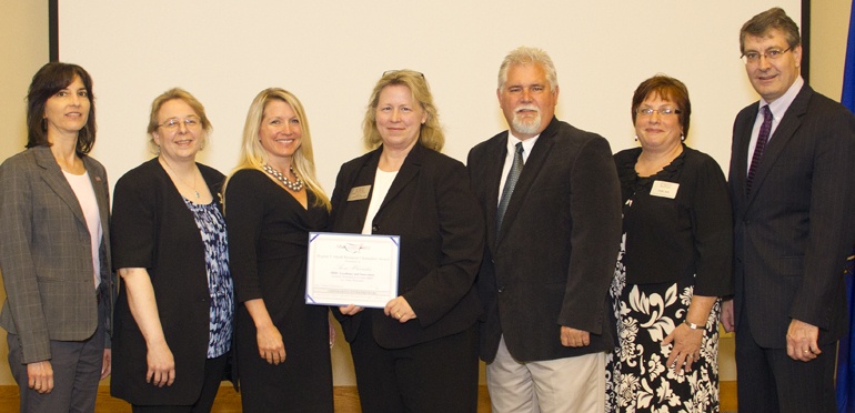 Group photo with award.