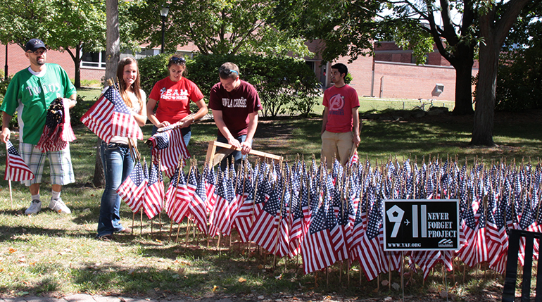 20120910_College_Repub_911_Remembrance_002w Photo of students putting out flags.